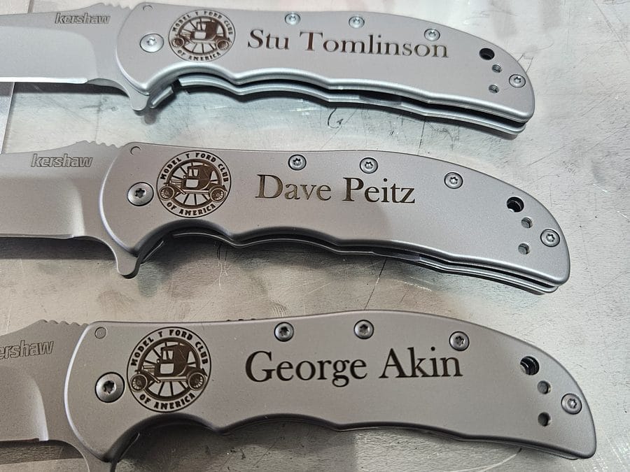 Personalized engraved pocket knives for a club order